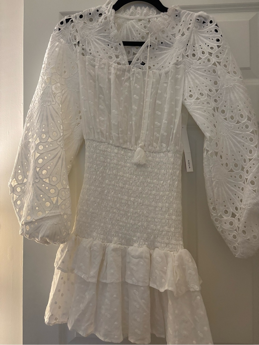 Aqua White Eyelet Smocked Long Sleeve Mini Dress with Ruffled Hem and Tassel Tie